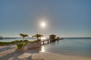 Coco Beach Resort Luxury Belize Resort Sunrise over Dock