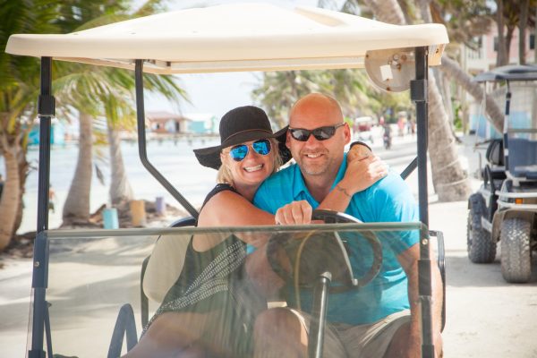 Couple Rent a Golf Cart